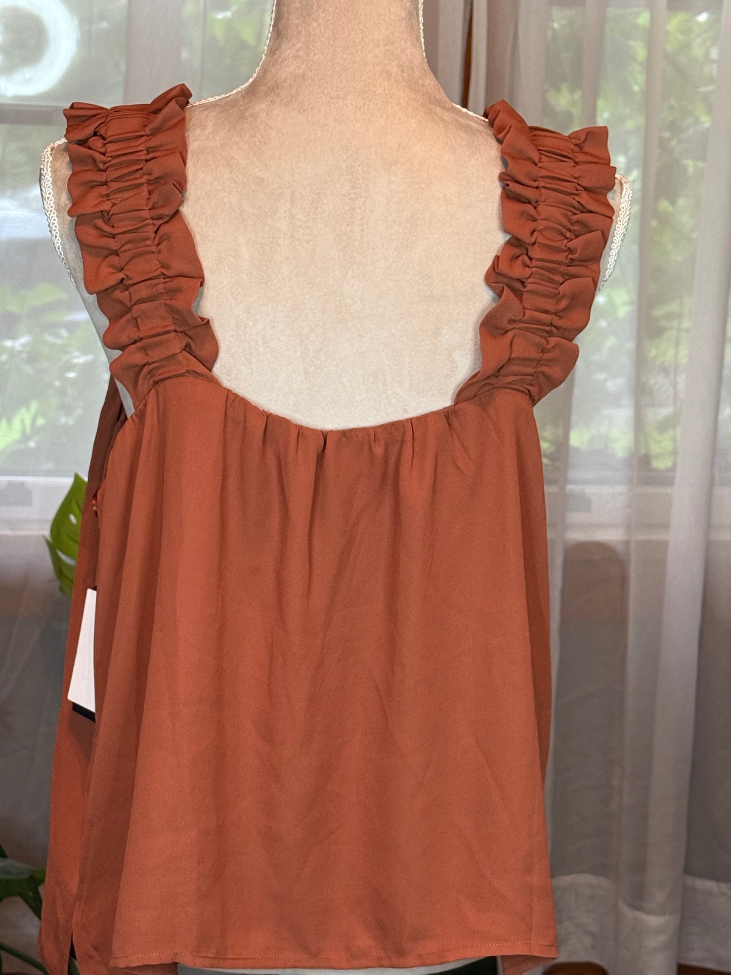 Melrose & Market Rust Tank